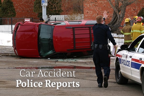 An overturned car, a cop, a police car, and a group of firefighters are on a road beside the words "Car Accident Police Reports"