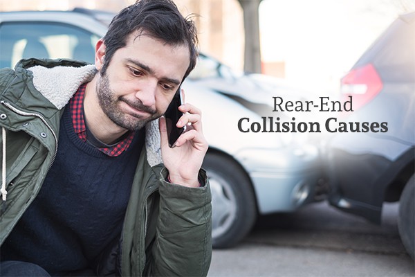 A man looking upset is on the phone with a rear end collision in the background with the words rear-end collision causes