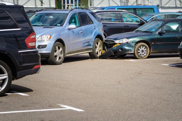 A rear-end collision in a parking lot.