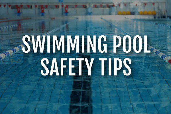 A lap pool with the words, "swimming pool safety tips."