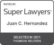 A badge showing Juan C. Hernandez was selected in 2021 for the Super Lawyers Award