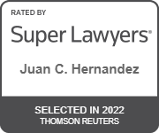 A badge showing Juan C. Hernandez was selected in 2022 for the Super Lawyers Award
