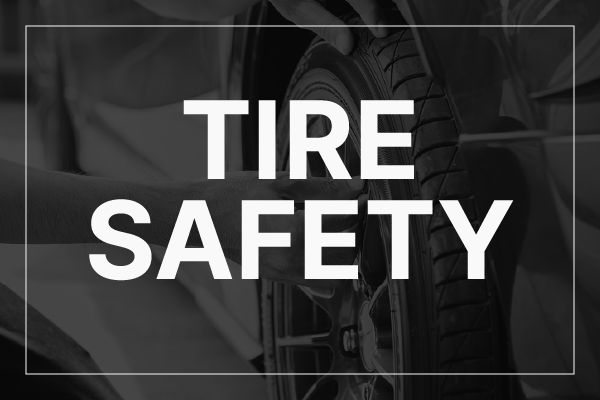 A closeup photo of a tire with the words, "tire safety."