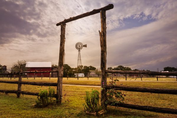 A windmill on a ranch.